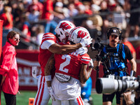 Wisconsin Badgers wide receiver Trech Kekahuna #2 outruns the Purdue Boilermakers defense for a touchdown at Camp Randall Stadium in Madison...