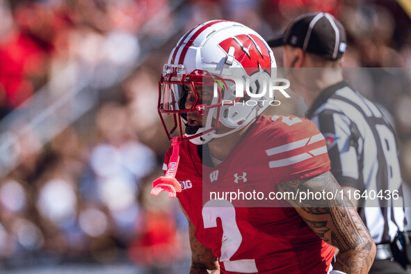 Wisconsin Badgers wide receiver Trech Kekahuna #2 outruns the Purdue Boilermakers defense for a touchdown at Camp Randall Stadium in Madison...