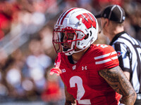 Wisconsin Badgers wide receiver Trech Kekahuna #2 outruns the Purdue Boilermakers defense for a touchdown at Camp Randall Stadium in Madison...