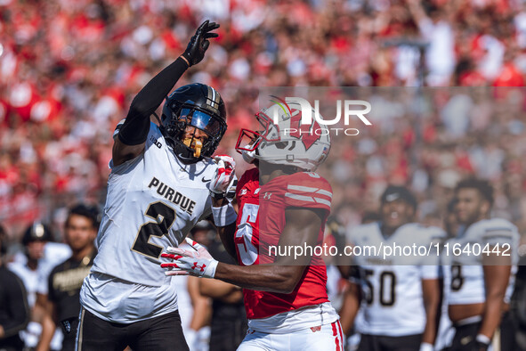 Purdue defensive back Nyland Green #2 defends Wisconsin Badgers wide receiver Quincy Burroughs #5 at Camp Randall Stadium in Madison, Wiscon...