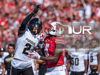 Purdue defensive back Nyland Green #2 defends Wisconsin Badgers wide receiver Quincy Burroughs #5 at Camp Randall Stadium in Madison, Wiscon...