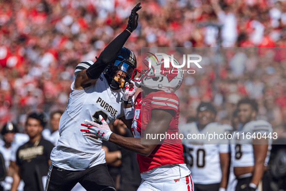 Purdue defensive back Nyland Green #2 defends Wisconsin Badgers wide receiver Quincy Burroughs #5 at Camp Randall Stadium in Madison, Wiscon...