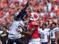 Purdue defensive back Nyland Green #2 defends Wisconsin Badgers wide receiver Quincy Burroughs #5 at Camp Randall Stadium in Madison, Wiscon...