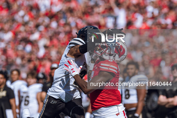 Purdue defensive back Nyland Green #2 defends Wisconsin Badgers wide receiver Quincy Burroughs #5 at Camp Randall Stadium in Madison, Wiscon...