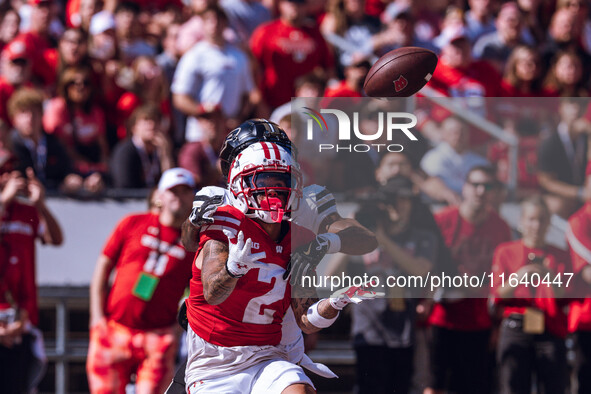 Wisconsin Badgers wide receiver Trech Kekahuna #2 catches a touchdown pass against the Purdue Boilermakers at Camp Randall Stadium in Madiso...