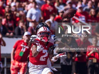 Wisconsin Badgers wide receiver Trech Kekahuna #2 catches a touchdown pass against the Purdue Boilermakers at Camp Randall Stadium in Madiso...