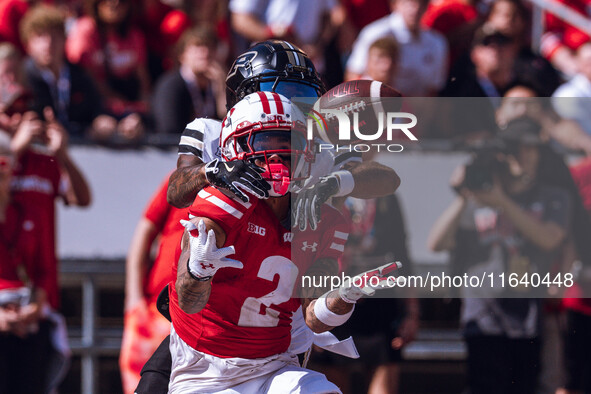 Wisconsin Badgers wide receiver Trech Kekahuna #2 catches a touchdown pass against the Purdue Boilermakers at Camp Randall Stadium in Madiso...