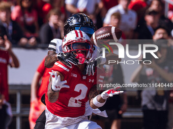 Wisconsin Badgers wide receiver Trech Kekahuna #2 catches a touchdown pass against the Purdue Boilermakers at Camp Randall Stadium in Madiso...