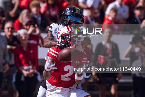 Wisconsin Badgers wide receiver Trech Kekahuna #2 catches a touchdown pass against the Purdue Boilermakers at Camp Randall Stadium in Madiso...