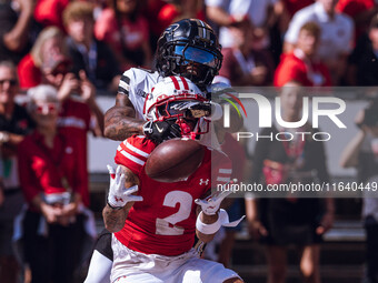 Wisconsin Badgers wide receiver Trech Kekahuna #2 catches a touchdown pass against the Purdue Boilermakers at Camp Randall Stadium in Madiso...