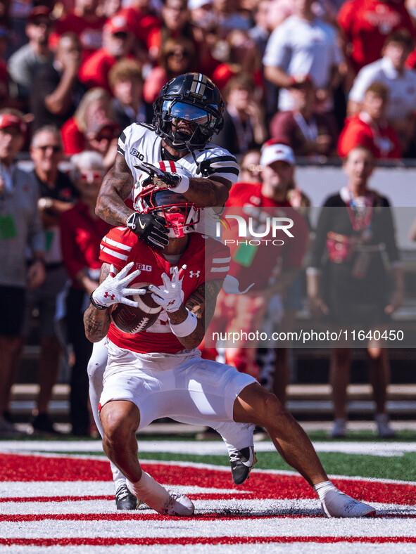 Wisconsin Badgers wide receiver Trech Kekahuna #2 catches a touchdown pass against the Purdue Boilermakers at Camp Randall Stadium in Madiso...