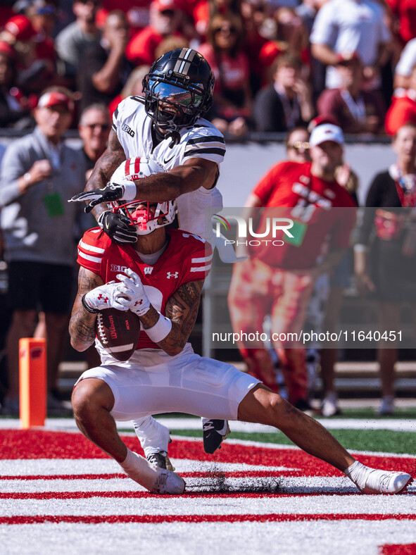 Wisconsin Badgers wide receiver Trech Kekahuna #2 catches a touchdown pass against the Purdue Boilermakers at Camp Randall Stadium in Madiso...