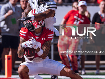 Wisconsin Badgers wide receiver Trech Kekahuna #2 catches a touchdown pass against the Purdue Boilermakers at Camp Randall Stadium in Madiso...