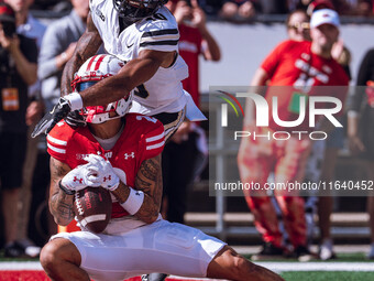 Wisconsin Badgers wide receiver Trech Kekahuna #2 catches a touchdown pass against the Purdue Boilermakers at Camp Randall Stadium in Madiso...