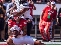 Wisconsin Badgers wide receiver Trech Kekahuna #2 catches a touchdown pass against the Purdue Boilermakers at Camp Randall Stadium in Madiso...