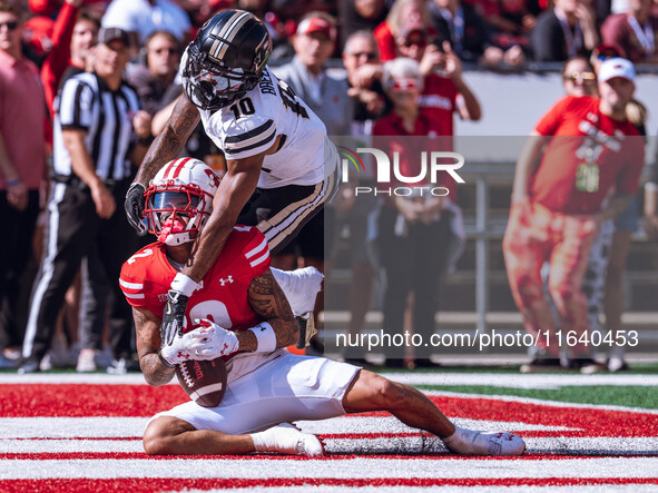 Wisconsin Badgers wide receiver Trech Kekahuna #2 catches a touchdown pass against the Purdue Boilermakers at Camp Randall Stadium in Madiso...