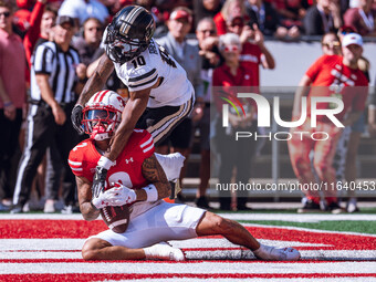 Wisconsin Badgers wide receiver Trech Kekahuna #2 catches a touchdown pass against the Purdue Boilermakers at Camp Randall Stadium in Madiso...