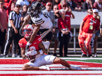 Wisconsin Badgers wide receiver Trech Kekahuna #2 catches a touchdown pass against the Purdue Boilermakers at Camp Randall Stadium in Madiso...