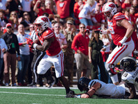 Wisconsin Badgers running back Tawee Walker #3 escapes the Purdue Boilermakers defense for a touchdown at Camp Randall Stadium in Madison, W...