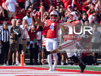 Wisconsin Badgers running back Tawee Walker #3 escapes the Purdue Boilermakers defense for a touchdown at Camp Randall Stadium in Madison, W...