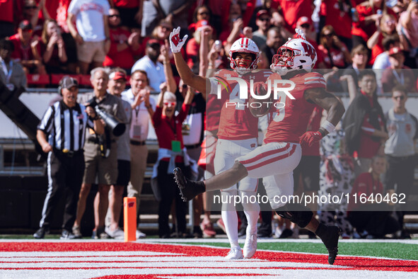 Wisconsin Badgers running back Tawee Walker #3 escapes the Purdue Boilermakers defense for a touchdown at Camp Randall Stadium in Madison, W...