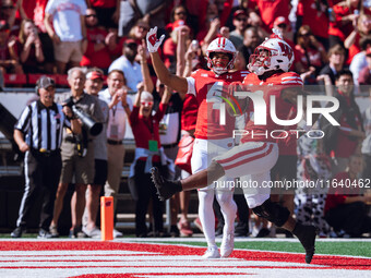 Wisconsin Badgers running back Tawee Walker #3 escapes the Purdue Boilermakers defense for a touchdown at Camp Randall Stadium in Madison, W...