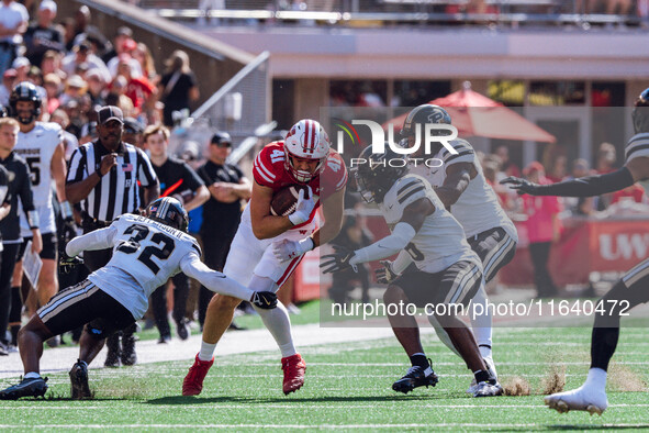 Wisconsin Badgers tight end JT Seagreaves #41 catches a pass against the Purdue Boilermakers at Camp Randall Stadium in Madison, Wisconsin,...