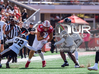 Wisconsin Badgers tight end JT Seagreaves #41 catches a pass against the Purdue Boilermakers at Camp Randall Stadium in Madison, Wisconsin,...