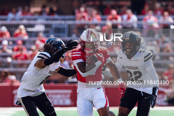 Wisconsin Badgers running back Dilin Jones #7 runs the ball against the Purdue Boilermakers at Camp Randall Stadium in Madison, Wisconsin, o...