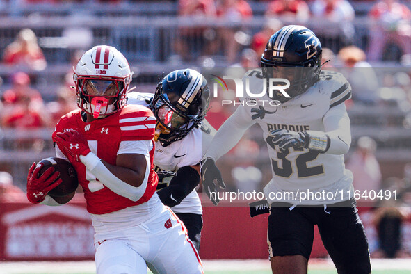 Wisconsin Badgers running back Dilin Jones #7 runs the ball against the Purdue Boilermakers at Camp Randall Stadium in Madison, Wisconsin, o...