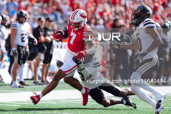 Wisconsin Badgers running back Dilin Jones #7 runs the ball against the Purdue Boilermakers at Camp Randall Stadium in Madison, Wisconsin, o...