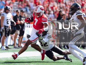 Wisconsin Badgers running back Dilin Jones #7 runs the ball against the Purdue Boilermakers at Camp Randall Stadium in Madison, Wisconsin, o...