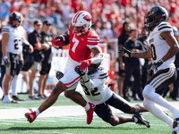 Wisconsin Badgers running back Dilin Jones #7 runs the ball against the Purdue Boilermakers at Camp Randall Stadium in Madison, Wisconsin, o...