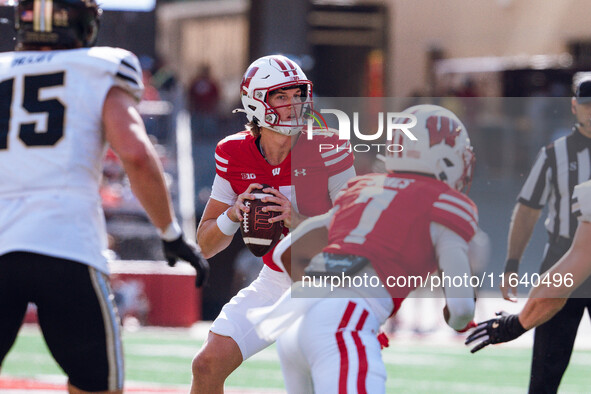 Wisconsin Badgers quarterback Mabrey Mettauer #11 looks to pass against the Purdue Boilermakers at Camp Randall Stadium in Madison, Wisconsi...