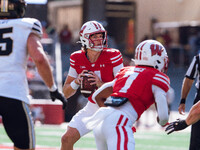 Wisconsin Badgers quarterback Mabrey Mettauer #11 looks to pass against the Purdue Boilermakers at Camp Randall Stadium in Madison, Wisconsi...