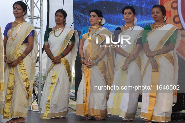 Women dress in traditional Kerala Kasavu sarees during the Onam Festival in Woodbridge, Ontario, Canada, on September 07, 2024. Onam is a ma...