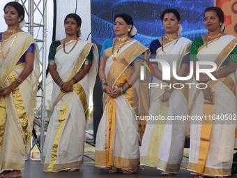 Women dress in traditional Kerala Kasavu sarees during the Onam Festival in Woodbridge, Ontario, Canada, on September 07, 2024. Onam is a ma...