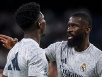 Antonio Rudiger of Real Madrid CF (right) talks with Aurelien Tchouameni of Real Madrid CF (left) during the La Liga EA Sports 2024/25 footb...