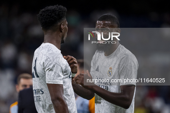 Antonio Rudiger of Real Madrid CF (right) talks with Aurelien Tchouameni of Real Madrid CF (left) during the La Liga EA Sports 2024/25 footb...