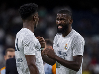 Antonio Rudiger of Real Madrid CF (right) talks with Aurelien Tchouameni of Real Madrid CF (left) during the La Liga EA Sports 2024/25 footb...