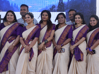 Women dress in sarees during the Onam Festival in Woodbridge, Ontario, Canada, on September 7, 2024. Onam is a major annual event for Malaya...