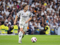 Luka Modric of Real Madrid CF is in action with the ball during the La Liga EA Sports 2024/25 football match between Real Madrid CF and Vill...