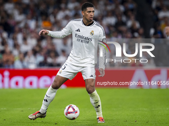 Jude Bellingham of Real Madrid CF is in action with the ball during the La Liga EA Sports 2024/25 football match between Real Madrid CF and...