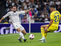 Daniel Carvajal of Real Madrid CF (L) competes for the ball against Sergi Cardona of Villarreal CF (R) during the La Liga EA Sports 2024/25...