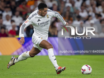 Jude Bellingham of Real Madrid CF is in action with the ball during the La Liga EA Sports 2024/25 football match between Real Madrid CF and...