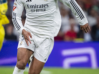 Jude Bellingham of Real Madrid CF is in action with the ball during the La Liga EA Sports 2024/25 football match between Real Madrid CF and...