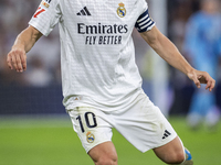 Luka Modric of Real Madrid CF is in action with the ball during the La Liga EA Sports 2024/25 football match between Real Madrid CF and Vill...