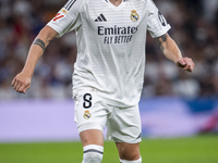 Federico Valverde of Real Madrid CF is in action with the ball during the La Liga EA Sports 2024/25 football match between Real Madrid CF an...