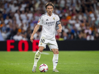 Luka Modric of Real Madrid CF is in action with the ball during the La Liga EA Sports 2024/25 football match between Real Madrid CF and Vill...