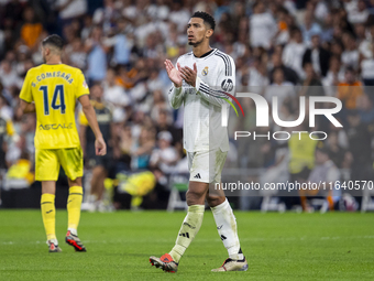 Jude Bellingham of Real Madrid CF cheers the fans at the end of the La Liga EA Sports 2024/25 football match between Real Madrid CF and Vill...